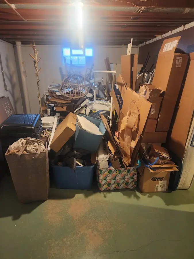 Roll-off dumpster container at job site for Roll Off Dumpster Rental in Kane